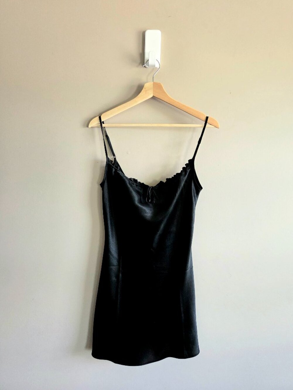 SilkSatin black mini slip dress.
